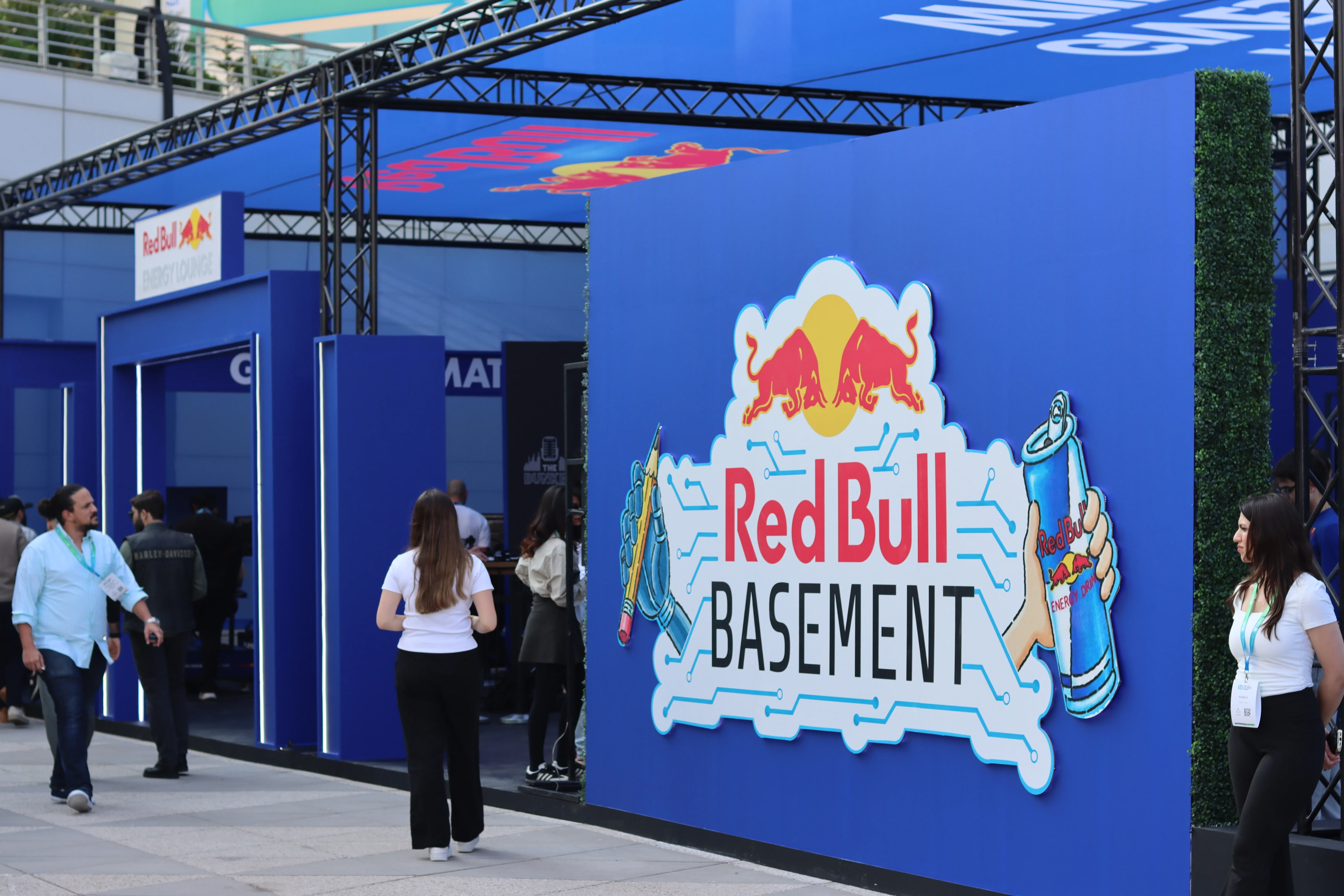 The Red Bull Energy Lounge was conceived as a multi-zone experiential stand designed to energize networking and content creation within the fast-paced environment of the 1 Billion Summit. The concept translated Red Bull's high-performance DNA into a bold architectural space that balanced intensity, movement, and social interaction.
